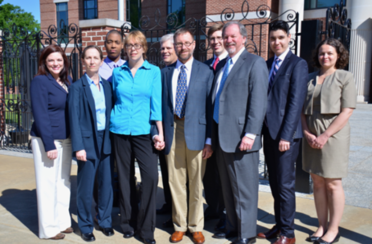 Advocates for Informed Choice staff and attorneys stand outside during their work on the M.C. case